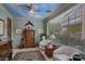 Cozy living room with a decorative ceiling, and view of the landscaped yard at 5445 Pendini Point Ct, Las Vegas, NV 89141