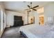 Large main bedroom with vaulted ceilings, wood-look floors, and a large dresser at 5638 Wild Olive St, Las Vegas, NV 89118