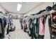 Spacious walk-in closet with shelving and racks for ample storage at 5638 Wild Olive St, Las Vegas, NV 89118
