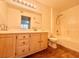 Bathroom with a double sink vanity, a toilet, and a shower-tub combination at 5710 E Tropicana Ave # 1055, Las Vegas, NV 89122