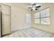 Cozy dining area with tiled flooring, natural light, and built-in storage cabinets at 5710 E Tropicana Ave # 1055, Las Vegas, NV 89122