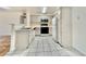Spacious kitchen featuring white appliances, sleek countertops, and ample cabinetry at 5710 E Tropicana Ave # 1055, Las Vegas, NV 89122