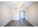 Neutral-colored bedroom with hardwood floors and a ceiling fan at 6160 Rumrill St # 121, Las Vegas, NV 89113