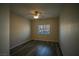 Empty bedroom with wood-look flooring and a ceiling fan at 6160 Rumrill St # 121, Las Vegas, NV 89113
