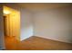 Spacious bedroom with hardwood flooring, and neutral paint at 62 E Serene Ave # 129, Las Vegas, NV 89123