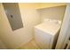 Clean and functional laundry area with dryer and tiled floor at 62 E Serene Ave # 129, Las Vegas, NV 89123