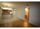 Stylish living area showing seamless transition to kitchen and bathroom at 62 E Serene Ave # 129, Las Vegas, NV 89123