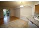 Bright living space with slider to outdoors and decorative archway at 62 E Serene Ave # 129, Las Vegas, NV 89123