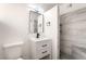 Contemporary bathroom featuring sleek vanity, modern fixtures, and tiled walk-in shower at 6205 Hargrove Ave, Las Vegas, NV 89107