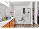 Bright bathroom featuring a double sink vanity, soaking tub, and separate glass-enclosed shower at 6829 Painted Morning Ave, Las Vegas, NV 89142