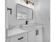 Modern bathroom featuring a sleek rectangular sink, marble countertop, and stylish black hardware at 6939 Paddington Way, Las Vegas, NV 89147