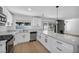 This newly renovated kitchen is bright and open and features stainless steel appliances at 6939 Paddington Way, Las Vegas, NV 89147