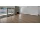 Spacious open-concept living area with fireplace and glass doors leading to the backyard pool at 6939 Paddington Way, Las Vegas, NV 89147