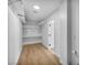 Storage room with wood-look floors and custom shelving at 6939 Paddington Way, Las Vegas, NV 89147