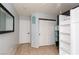 Light and bright bedroom with tiled flooring, large closet and simple decor at 7697 Morning Lake Dr, Las Vegas, NV 89131