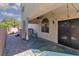 Outdoor patio with decorative lighting, ceiling fan, and hot tub for relaxation at 7697 Morning Lake Dr, Las Vegas, NV 89131
