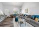 Spacious living room with comfortable seating, clerestory windows and modern decor at 7984 Laurena Ave, Las Vegas, NV 89147