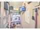 Well organized closet with shelving, security camera monitor, and lots of storage space at 8126 Majestic Bighorn St, Las Vegas, NV 89166