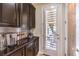 Gourmet coffee bar with espresso machine and storage at 8126 Majestic Bighorn St, Las Vegas, NV 89166