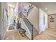 Hallway with staircase, high ceilings, and light hardwood floors at 8126 Majestic Bighorn St, Las Vegas, NV 89166