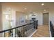 Elegant foyer featuring a chandelier and staircase with wood flooring on the second floor at 8126 Majestic Bighorn St, Las Vegas, NV 89166