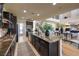 Open kitchen featuring an island with granite countertops and stainless steel appliances at 8126 Majestic Bighorn St, Las Vegas, NV 89166