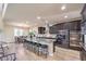 Stylish kitchen features granite countertops, stainless steel appliances, and a large center island at 8126 Majestic Bighorn St, Las Vegas, NV 89166