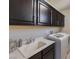 Modern laundry room with sleek cabinetry and updated appliances at 8126 Majestic Bighorn St, Las Vegas, NV 89166