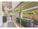 Open living space featuring modern decor, hardwood floors, and a sliding glass door to the patio at 8126 Majestic Bighorn St, Las Vegas, NV 89166