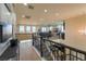 Spacious loft area with hardwood floors, recessed lighting, and wrought iron railing at 8126 Majestic Bighorn St, Las Vegas, NV 89166