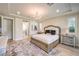 Large bedroom with chandelier and walk-in closet at 8126 Majestic Bighorn St, Las Vegas, NV 89166