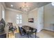 Stylish office features unique desk, shuttered windows, modern chandelier, and decor at 8126 Majestic Bighorn St, Las Vegas, NV 89166