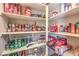 Walk-in pantry with well-stocked shelves and basket drawers for optimal storage at 8126 Majestic Bighorn St, Las Vegas, NV 89166