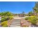Community playground with modern equipment, seating, and landscaping under a clear blue sky at 8126 Majestic Bighorn St, Las Vegas, NV 89166
