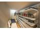 Organized shoe closet featuring multiple shelves and seating at 8126 Majestic Bighorn St, Las Vegas, NV 89166