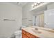Clean bathroom with vanity sink, neutral walls, and shower over tub at 8316 Vibrant Dr, Las Vegas, NV 89117