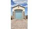 Spacious single car garage with stone accents and a charming arched entrance at 8528 Baltimore Heights Ct, Las Vegas, NV 89113