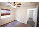 Bedroom with neutral carpet, window with blind, and closet providing comfort and functional storage space at 9526 Borough Park St, Las Vegas, NV 89178