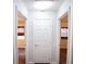 Hallway showing access to multiple rooms and interior doors at 9526 Borough Park St, Las Vegas, NV 89178