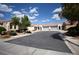 Charming street featuring well-maintained homes, lush landscaping, and ample parking in a desirable community at 9526 Borough Park St, Las Vegas, NV 89178