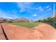 Community baseball field with manicured grass and mountain views at 9812 Folsom Dr, Las Vegas, NV 89134