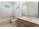 Neutral colored bathroom featuring a shower-tub combo and vanity at 9812 Folsom Dr, Las Vegas, NV 89134