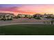 Scenic view of the community with lush green fairways and beautifully landscaped homes at 9812 Folsom Dr, Las Vegas, NV 89134