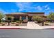 Exterior view of the fitness center with well-maintained landscaping, and a clear view of the entrance at 9812 Folsom Dr, Las Vegas, NV 89134