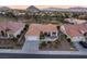Inviting Sun City Summerlin residence with a well-kept front yard and a convenient two-car garage at 9812 Folsom Dr, Las Vegas, NV 89134