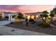 Beautiful front yard with desert landscaping, creating a welcoming curb appeal at 9812 Folsom Dr, Las Vegas, NV 89134