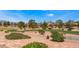Scenic golf course view surrounded by mature trees and well-maintained landscaping at 9812 Folsom Dr, Las Vegas, NV 89134