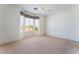 Spacious main bedroom features a bay window, plush carpeting, and ample natural light at 9812 Folsom Dr, Las Vegas, NV 89134
