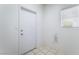 Mud room with tile floors and access to the outside at 9812 Folsom Dr, Las Vegas, NV 89134