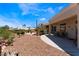 Inviting patio area with ample space for entertaining and relaxing in the desert sun at 9812 Folsom Dr, Las Vegas, NV 89134